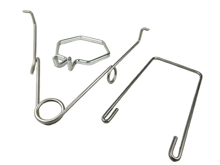 A set of formed-wire wire forms: hooks, clips, forks and a bent rod with a bright finish