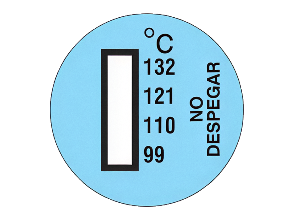 Etiqueta circular azul del sensor sin activar, con los cuatro puntos de control en blanco y la escala 99–132 °C impresa junto a la indicación NO DESPEGAR.